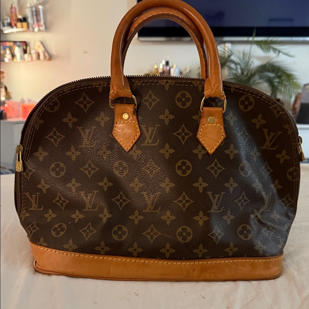 Louis Vuitton Alma handbag